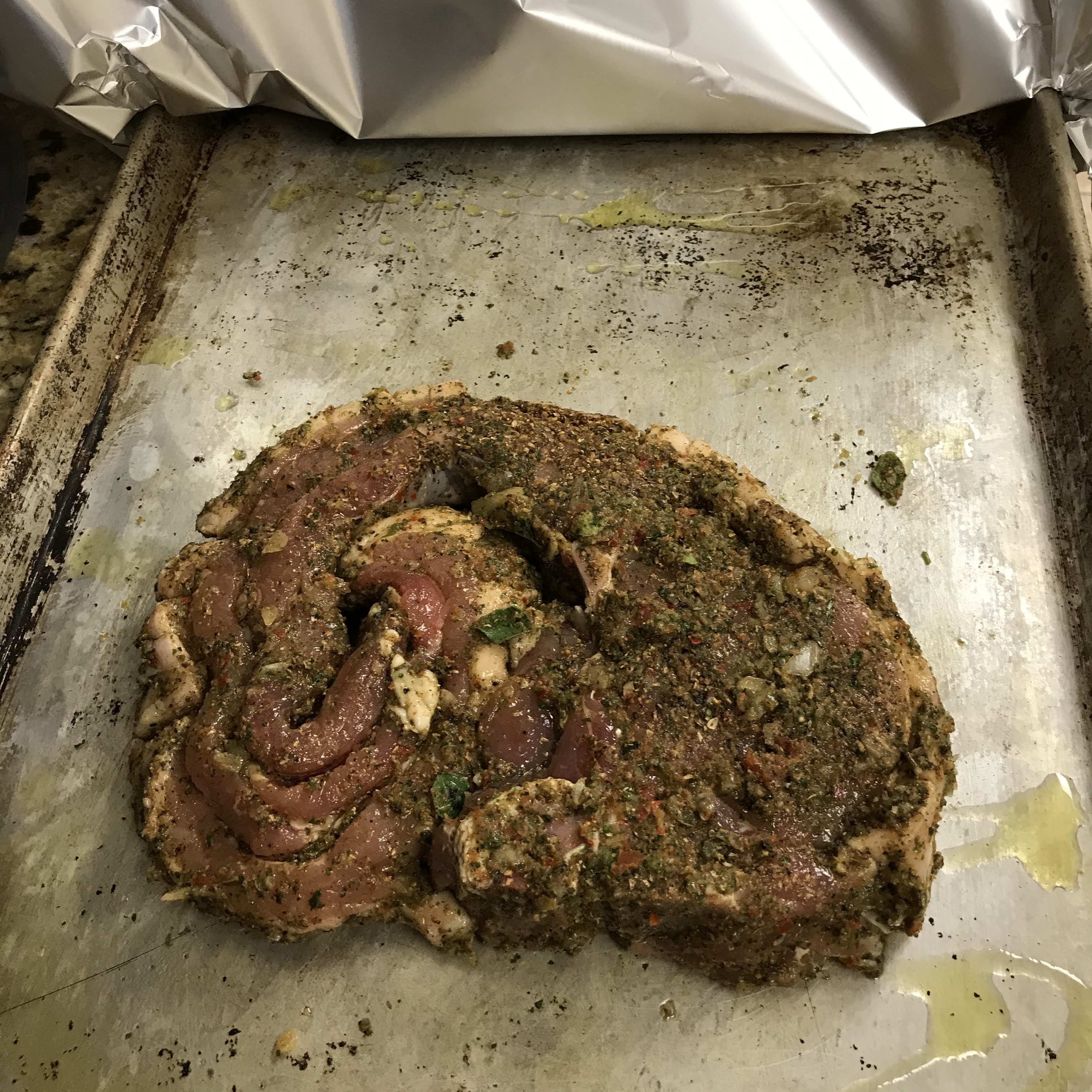 Seasoned pork ready for the oven